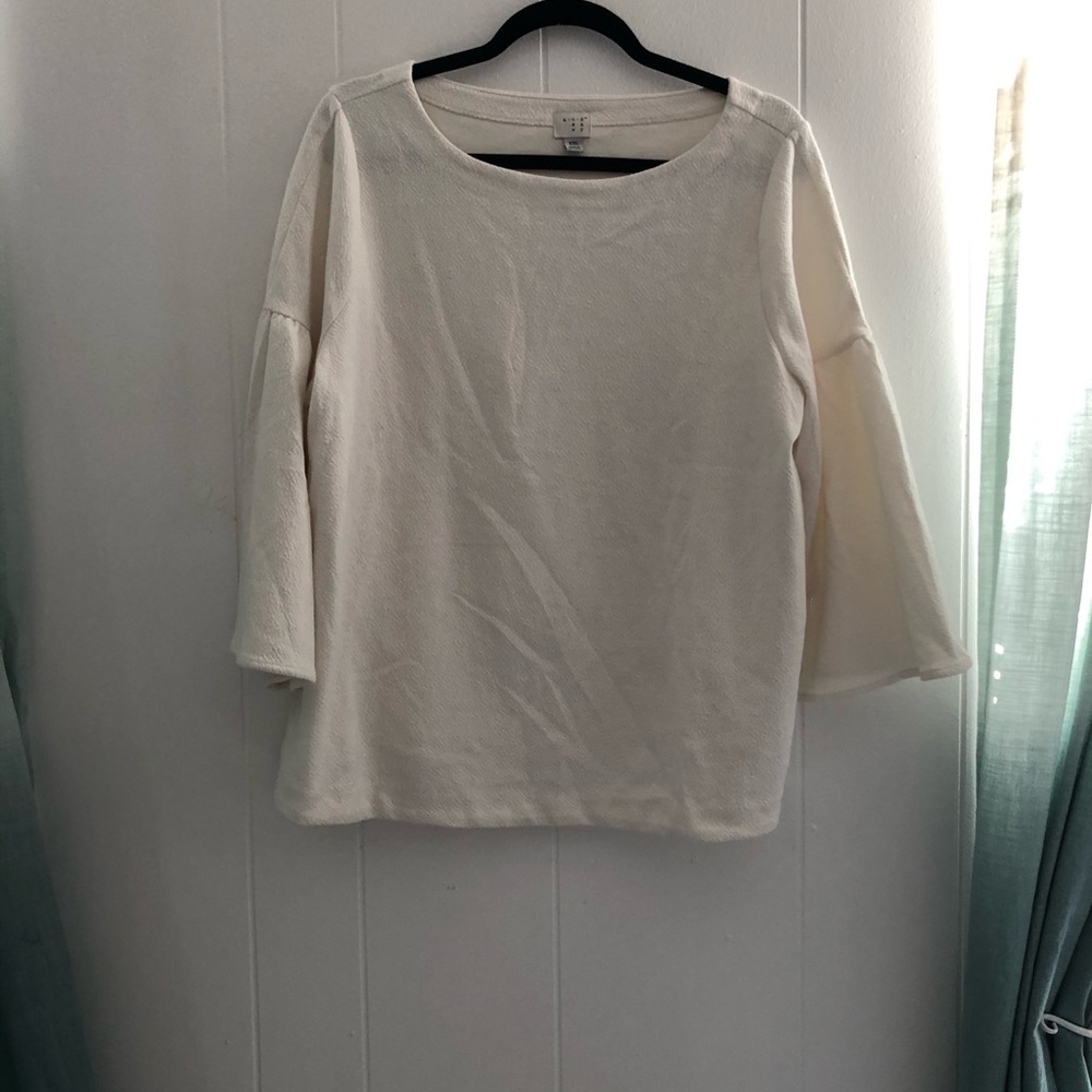 White top with flare sleeves